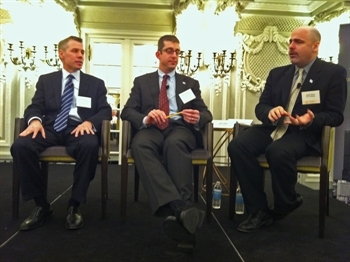 Panelists Jason DeHann (from left), Brett Goldstein and John Tolva, who serve as Chicago's CIO, Chief Data Officer and Chief Technology Officer respectively.